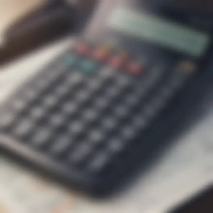 Close-up of a calculator with financial documents