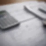 Home equity loan document on a desk with a calculator and financial reports.